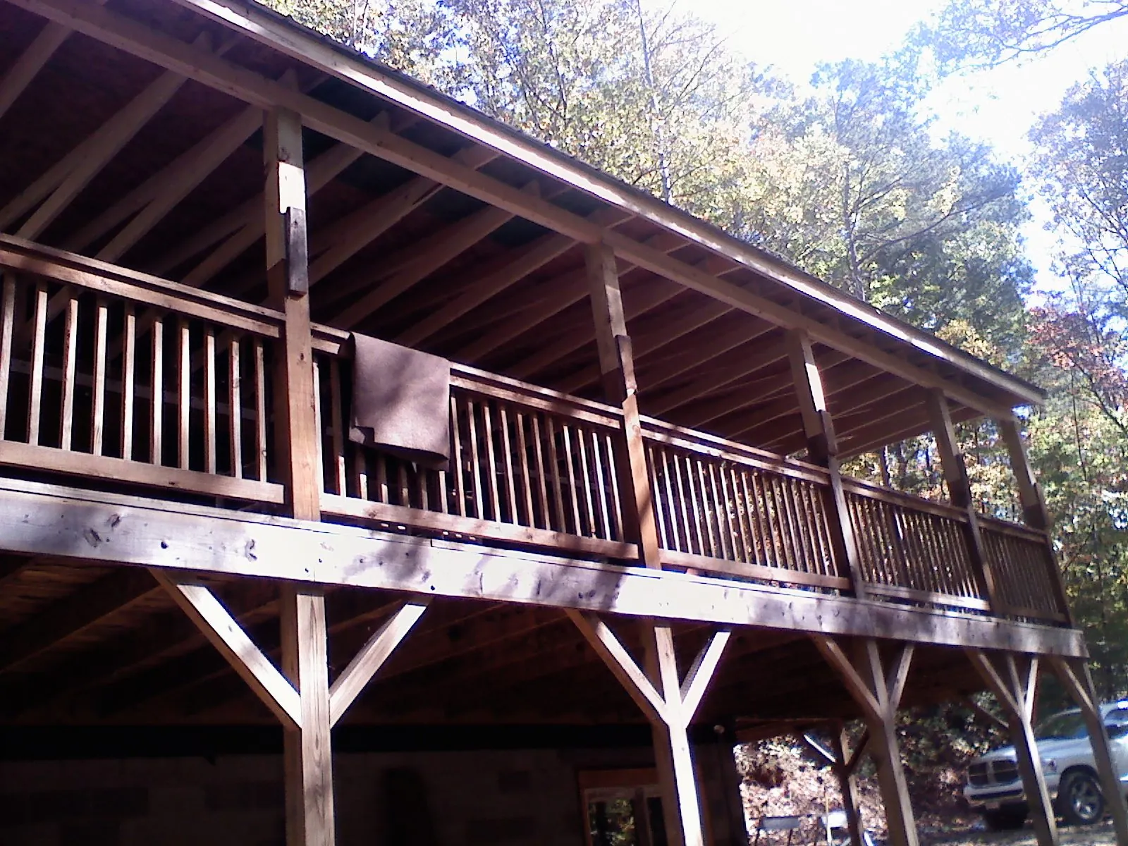 Timber framing under a new elevated porch and deck — Roof Leak Repair in Newport Coast by Roofing Brothers